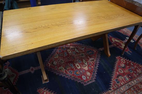 A light oak refectory style table on X-shaped end supports L.168cm